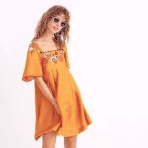 Madewell Embroidered Square Neck Mini
Dress in Dark Mustard